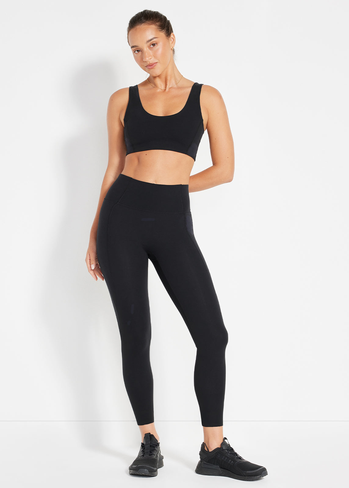 Black scoop crop and high-rise leggings designed for everyday movement and comfort