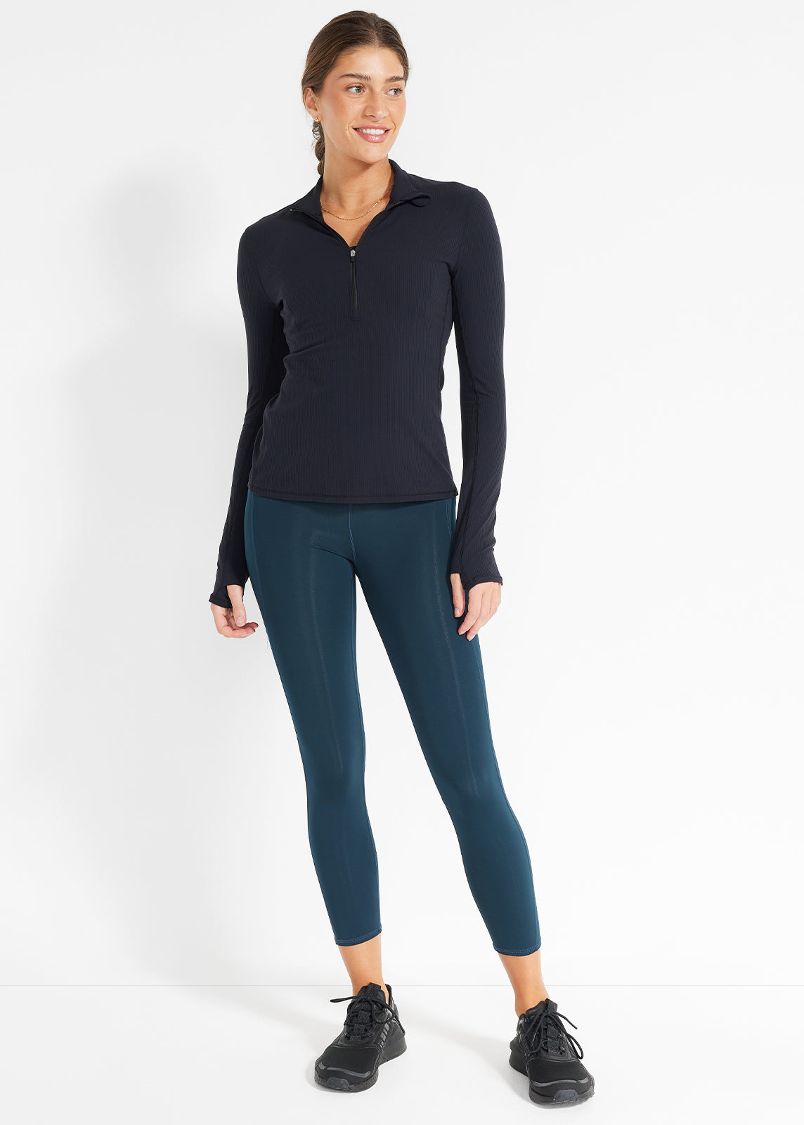 Chocolate flared pants with callouts highlighting buttery soft feel and pocket features