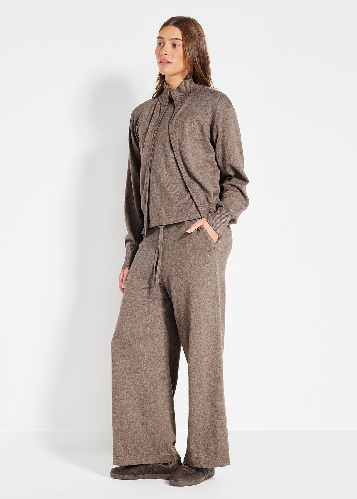Back view of brown knit lounge set with short sleeve top and wide-leg pants