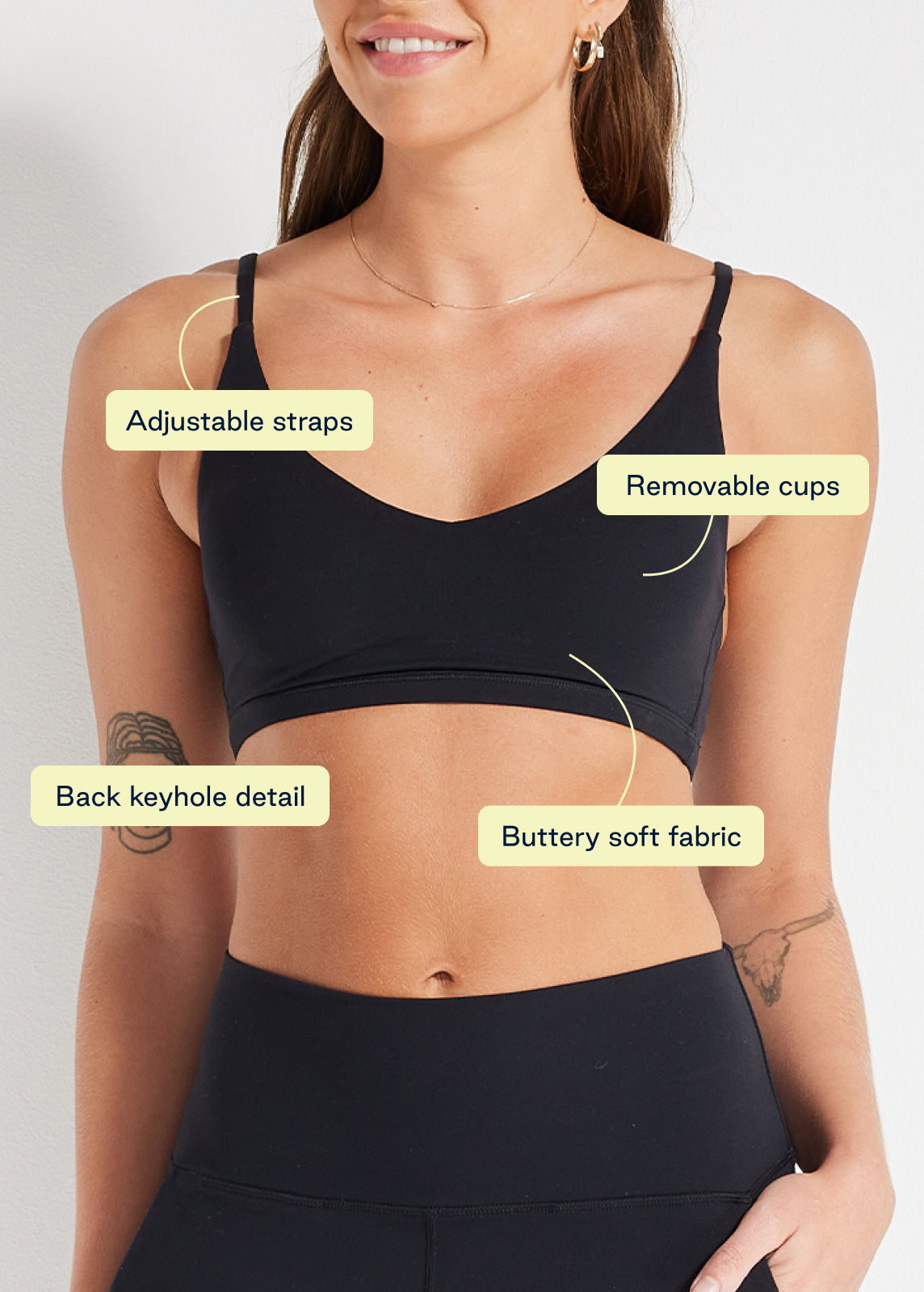 Detail shot of black bralette with adjustable straps, removable cups and buttery soft fabric