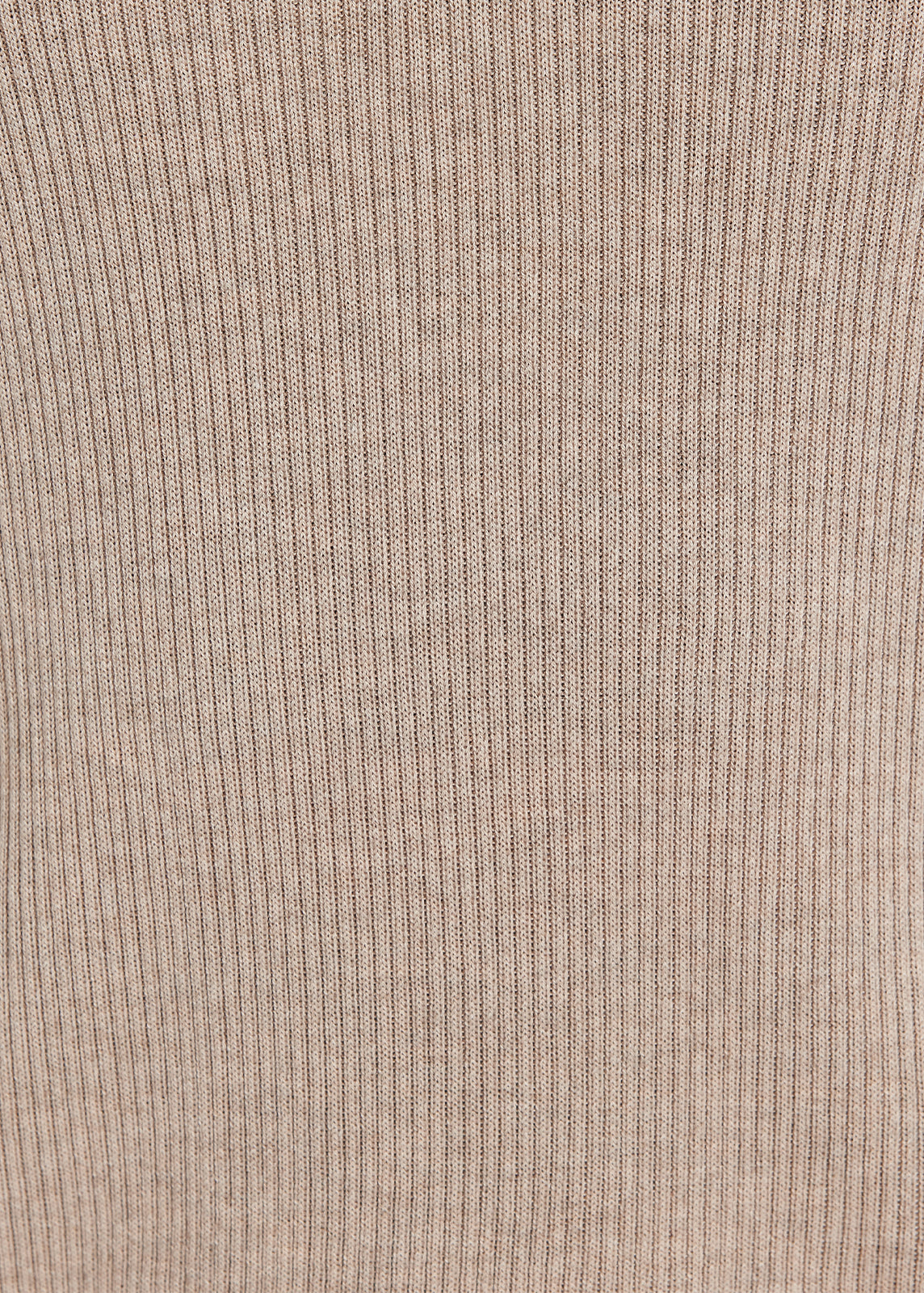 Close-up of beige ribbed knit fabric texture
