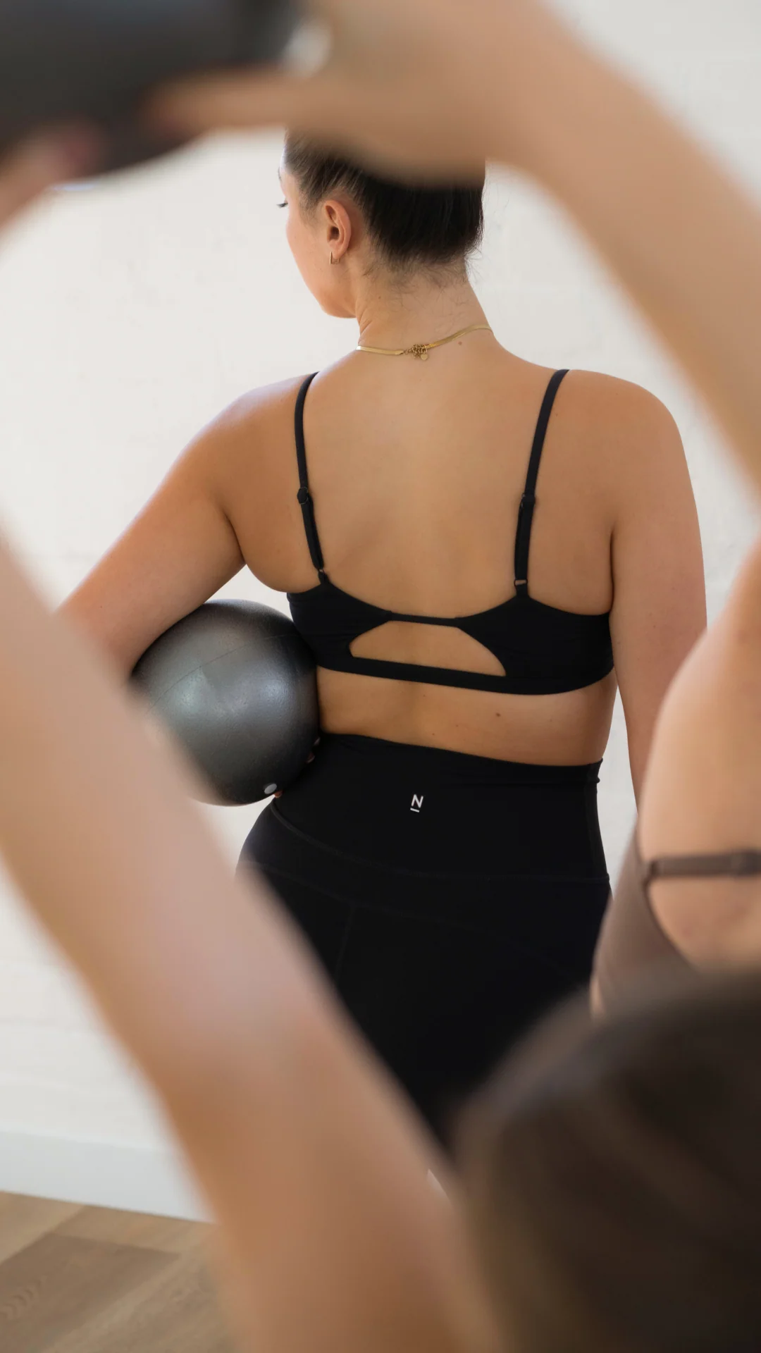 Video of a woman wearing Nimble In Motion activewear across a series of everyday scenes